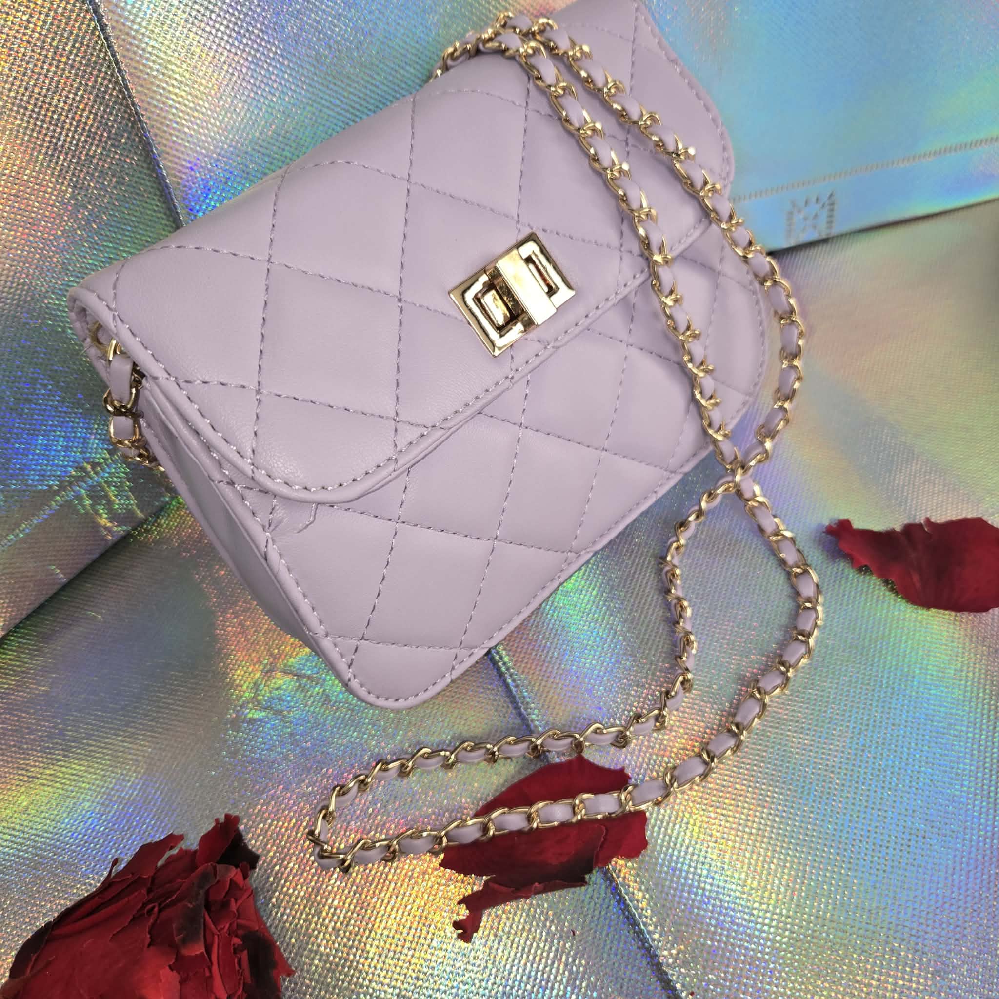 Sac matelassés mauve chic