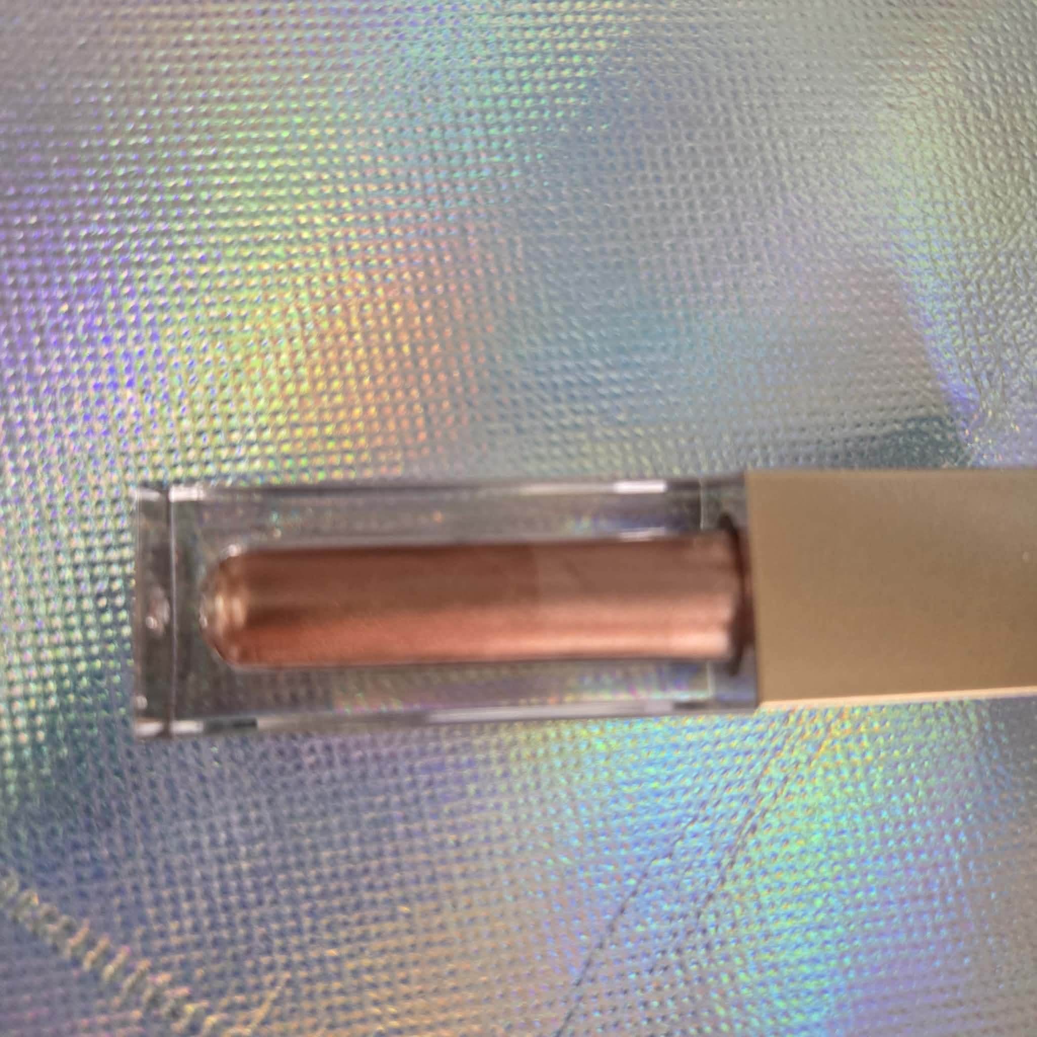 Lip gloss and Liquid highlighter —